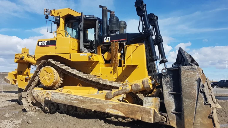 Yellow Caterpillar D10T bulldozer prepped for mobile heavy equipment interior cab detailing in Calgary by Anderson Fleet Restoration
